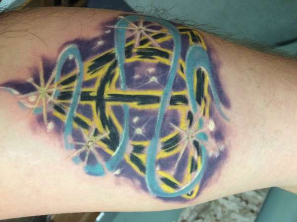 The deathly hallows tattoo
