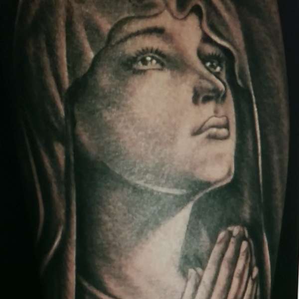 Virgin Mary tattoo by Steve'O tattoo