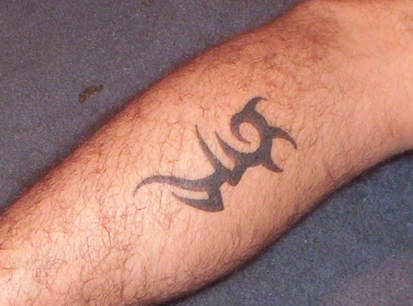 Firey Tikki Man tattoo