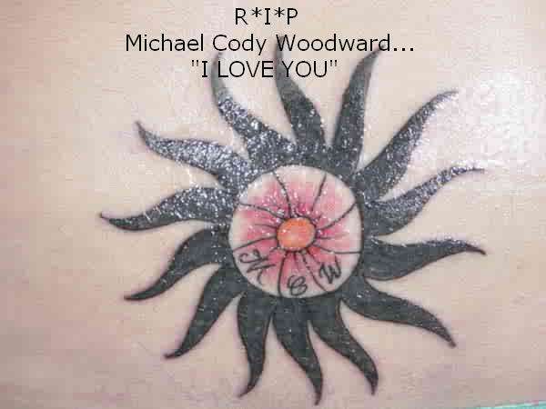 Sun Rays w/ Flower in Middle tattoo