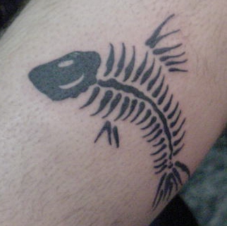 Beir's dead fish tattoo