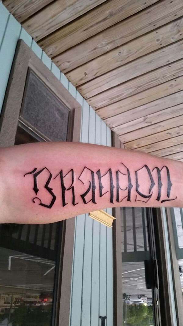 my children's names. Brandon and then upside down,  Isabelle tattoo