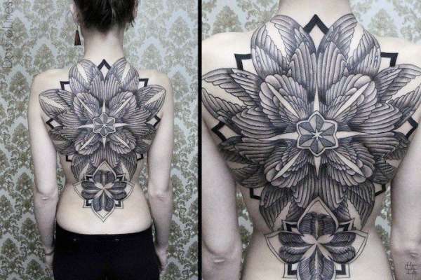 A FEW HOURS OF INK WORK ON THIS GIRLS BACK tattoo