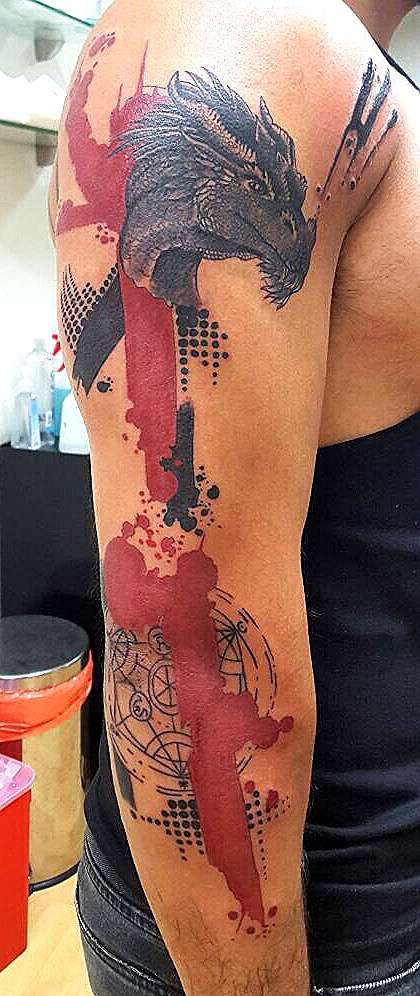 Dragon in semi trash polka style tattoo