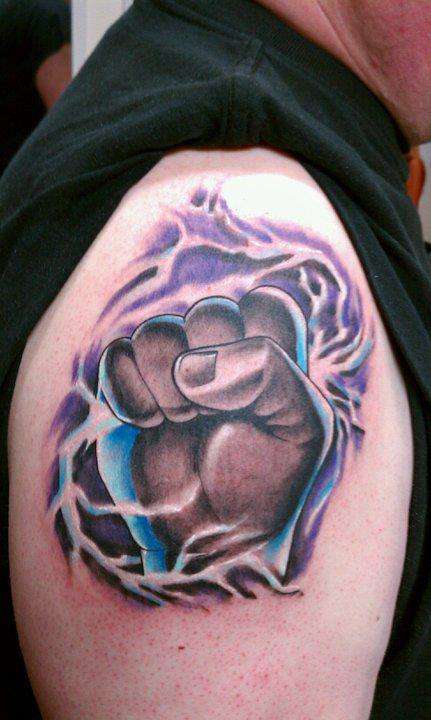 Fist holding High Voltage tattoo