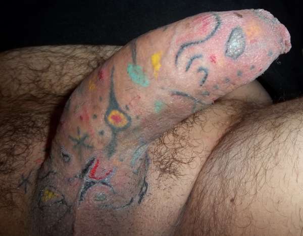 Penis tattoo - Penis like a painted canvas tattoo.