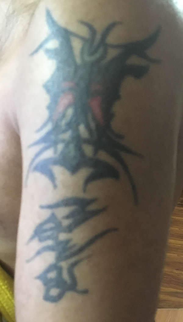 TRIBAL COVER UP tattoo