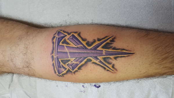 The Undertaker Crucifix tattoo