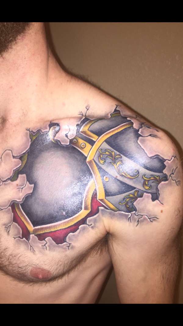 Tore skin armour tattoo