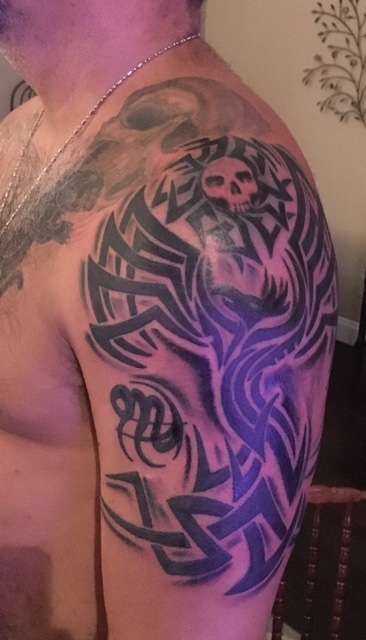 Tribal Phoenix tattoo