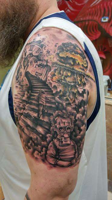 Upper arm piece tattoo