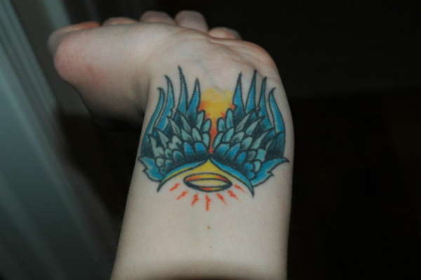 Wrist Wings tattoo