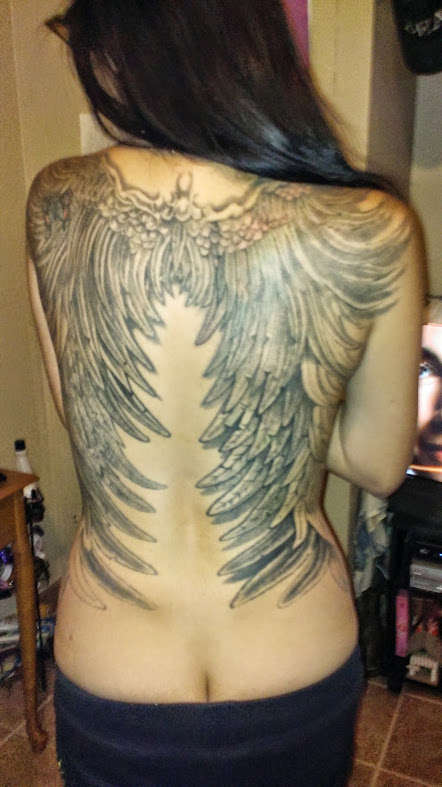 jeannies wings tattoo