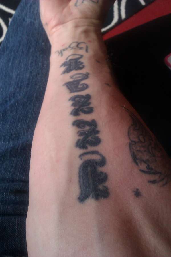 my boys name izzak tattoo