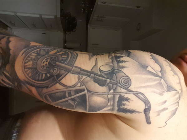 rear view 3/4 sleeve tattoo