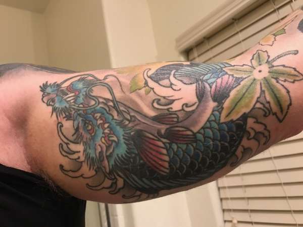 Biceps Koi dragon tattoo