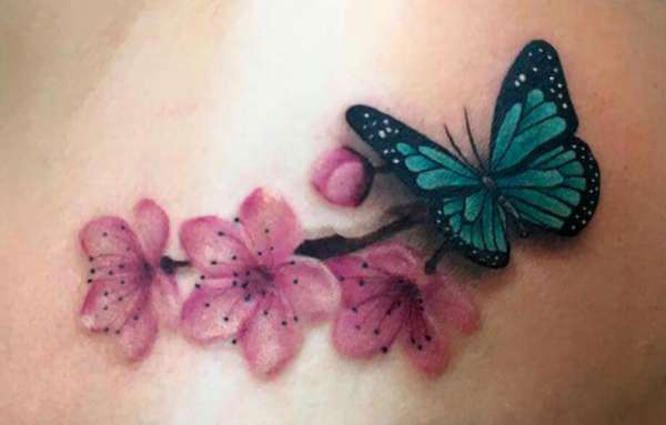 Butterfly and cherry blossom tattoo