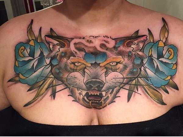 Chest wolf tattoo