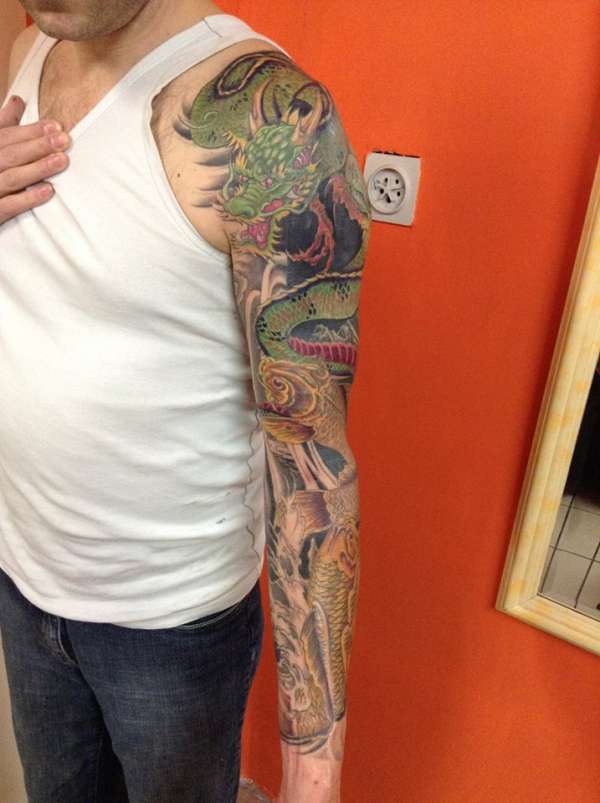Dragon Koi sleeve tattoo