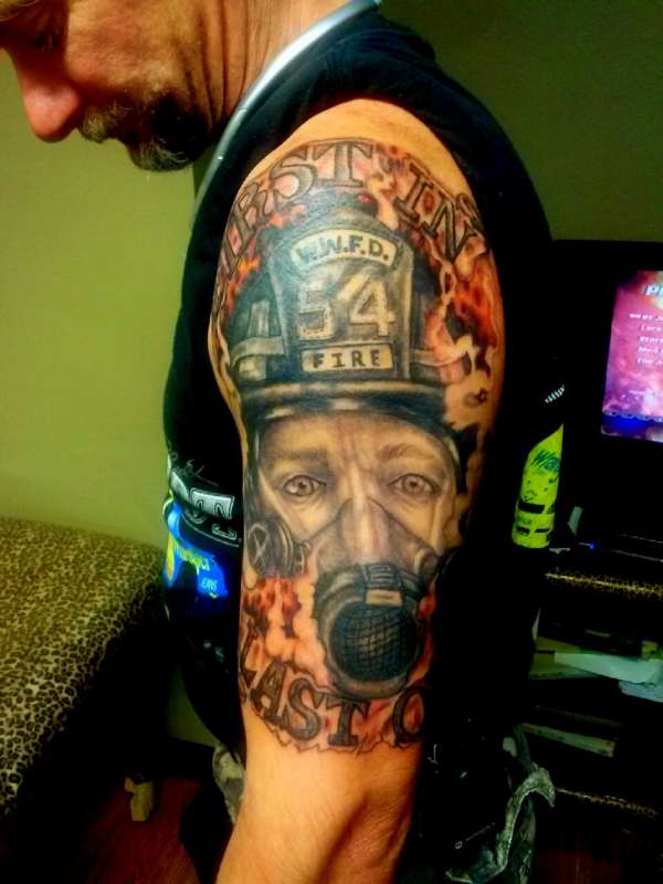 FIRST IN -LAST OUT firefighter tattoo by Jessica Morsey tattoo