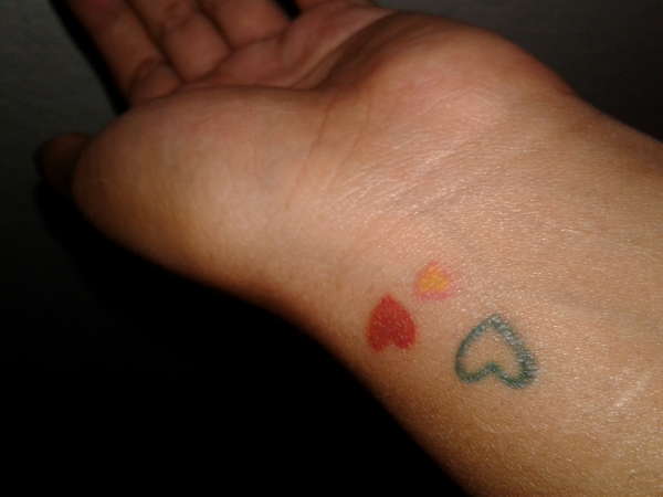 Three hearts tattoo