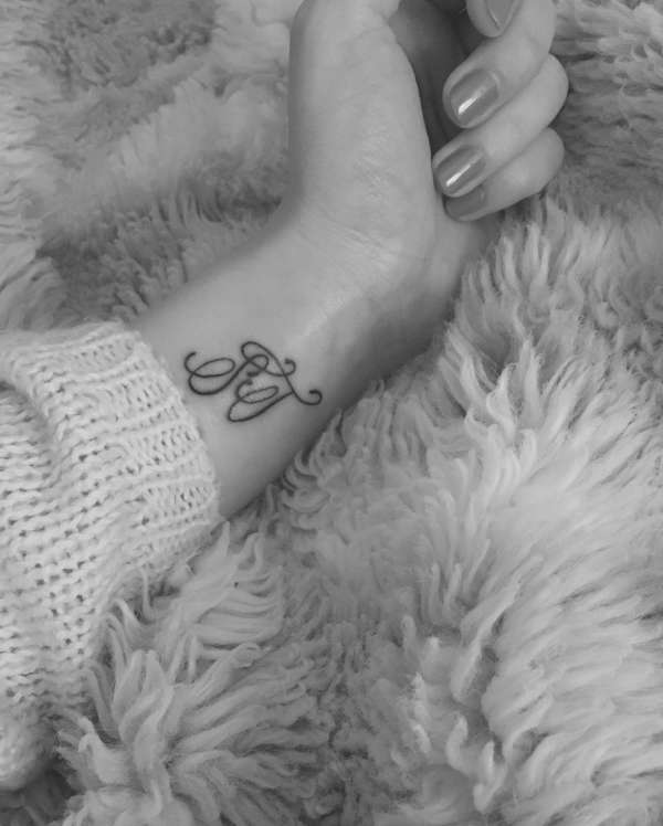 Wrist initials tattoo touch up tattoo