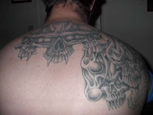 three skulls tattoo