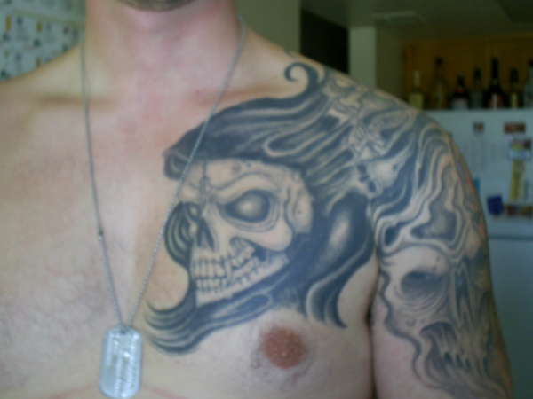 left chest tattoo
