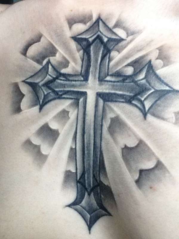 unique cross in heaven tattoo