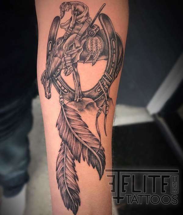 End of the trail – horse shoe - feathers tattoo