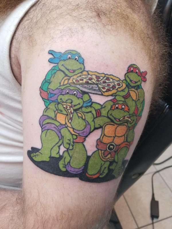 baby ninja turtle and vilan tattoo