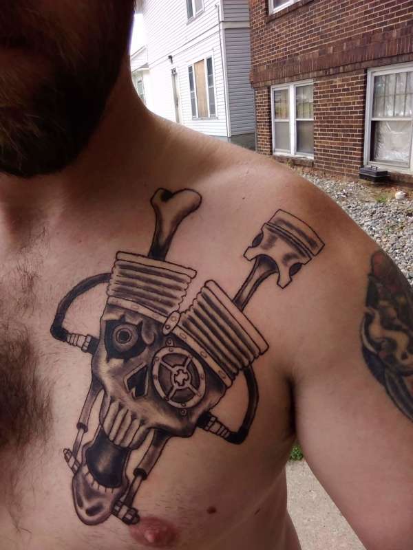 Skull with blown motor tattoo