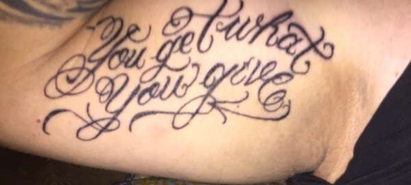 "You Get What You Give" tattoo