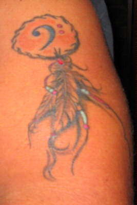 native american bass player available -seeks situations tattoo