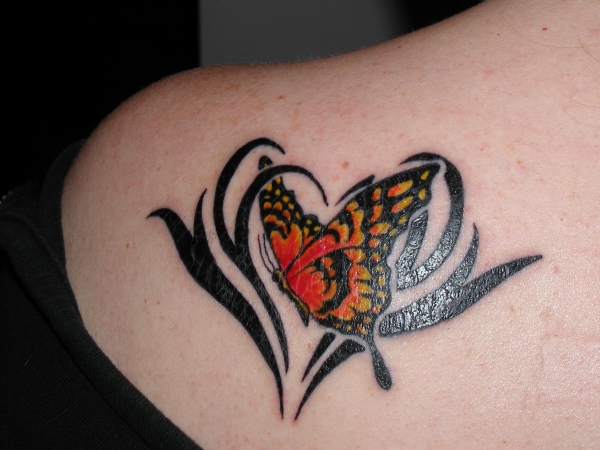 squirls butterfly tattoo