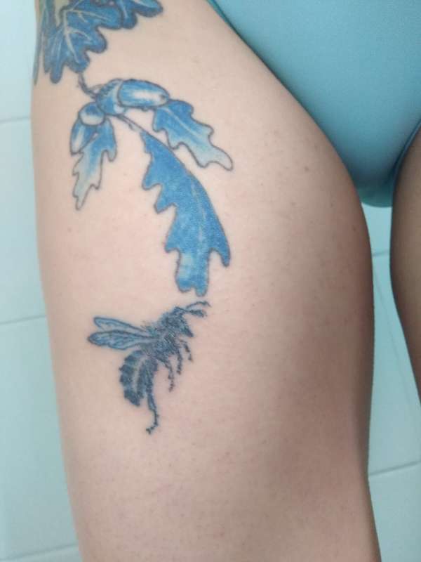 Bee with oak leaves tattoo