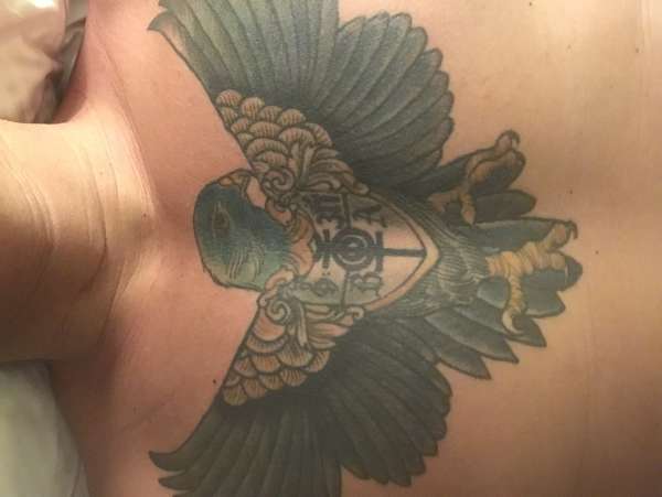Chest tattoo bird tattoo