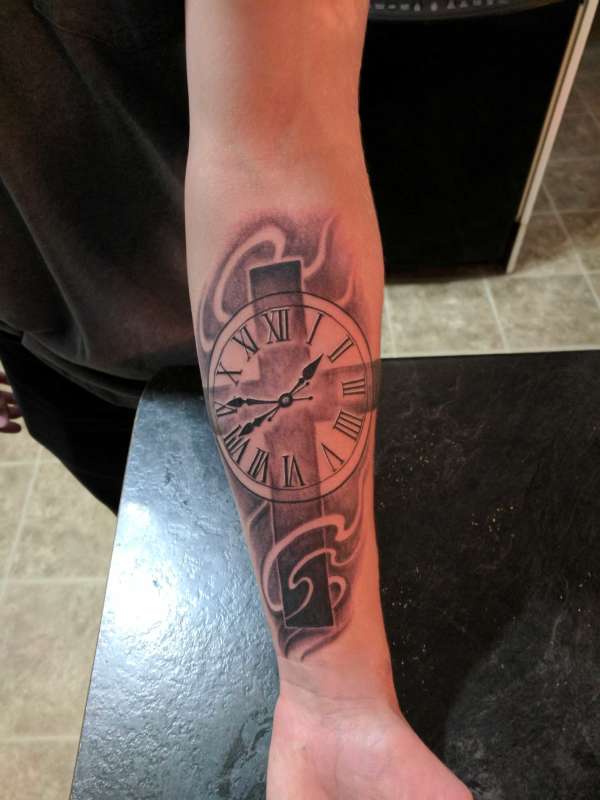 Clock and cross tattoo