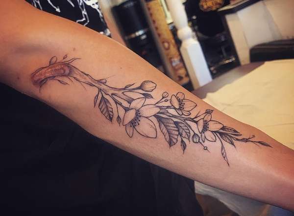 Plum blossom scar cover-up tattoo