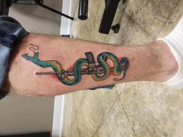 Snake and Gun tattoo
