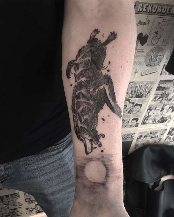 Wolfe chasing the moon tattoo