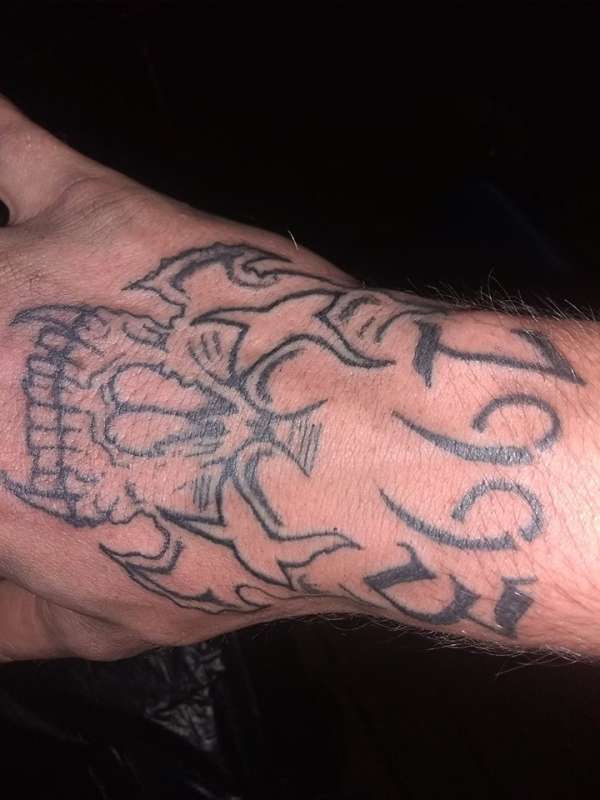 skull tattoo by santa clause!!!!! tattoo