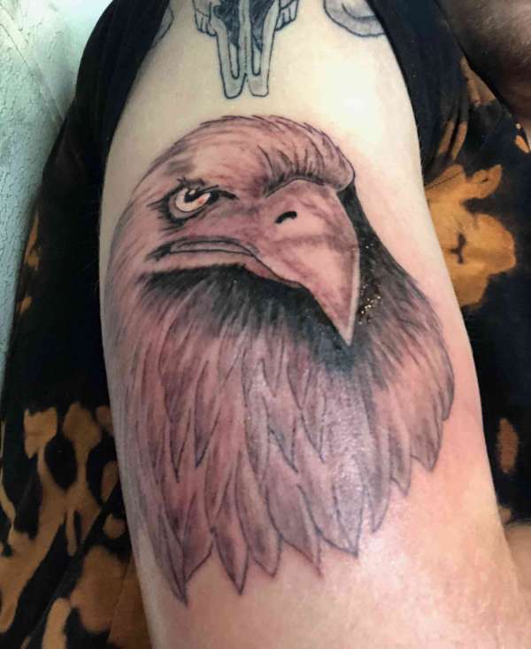 Bird head tattoo
