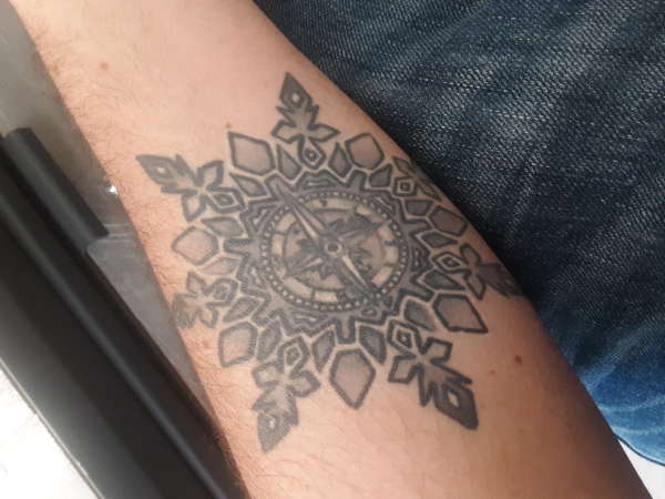 Snowflake compass tattoo
