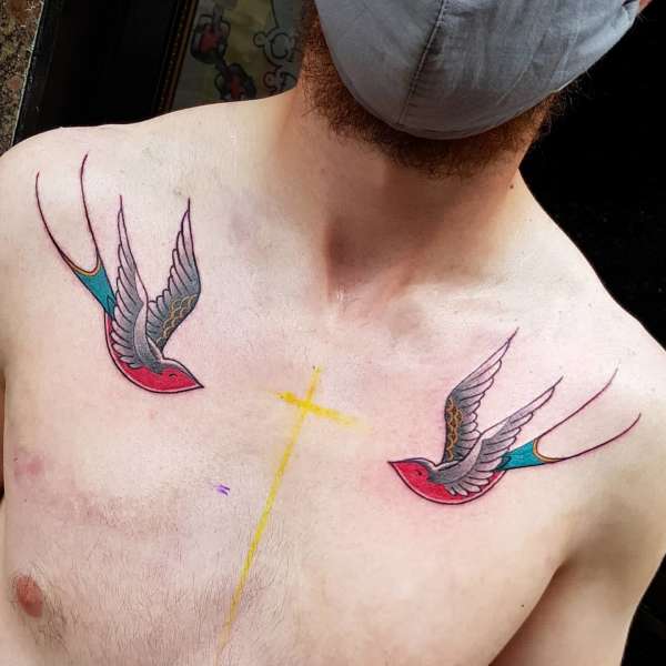 Trad swallows tattoo