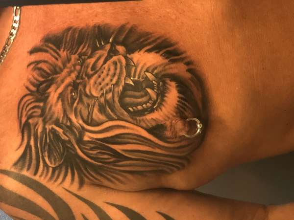 Tribal Lion Chest Tattoo tattoo