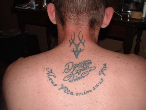 Neck and back tattoo