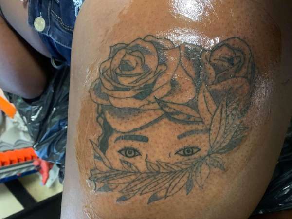 lady with flowers tattoo
