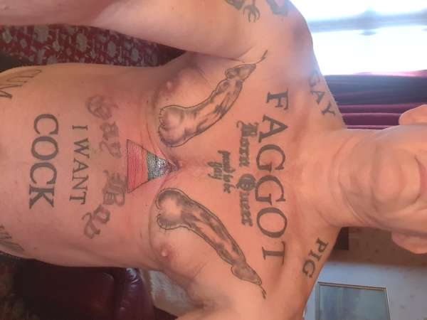Cock and balls tattooed on Faggot tattoo