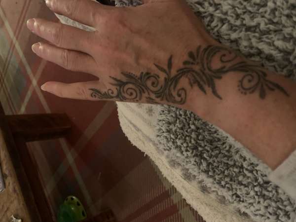 Filagree Hand tattoo tattoo